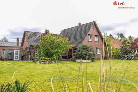 Außenansicht - Haus kaufen in Zetel - Klassisches Siedlungshaus in ruhiger Siedlung