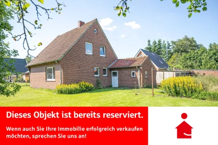 Außenansicht - Haus kaufen in Ovelgönne - Reserviert! Freier Blick über die Felder der Wesermarsch