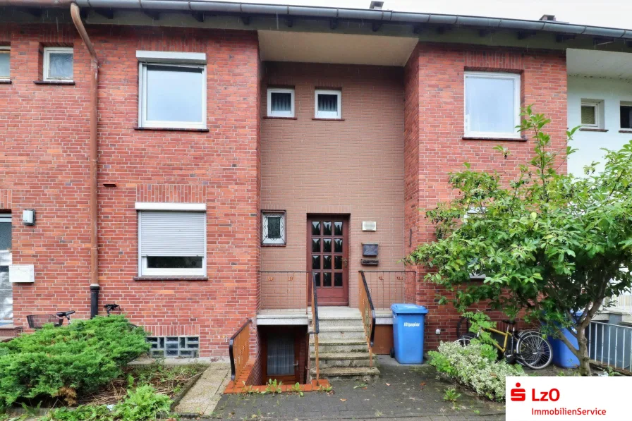 Außenansicht - Haus kaufen in Brake - Reihenmittelhaus mit Garage in Brake