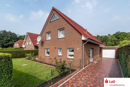 Außenansicht - Haus kaufen in Wittmund - Top gepflegtes und sehr modern eingerichtetes EFH in zentrumsnähe von Wittmund