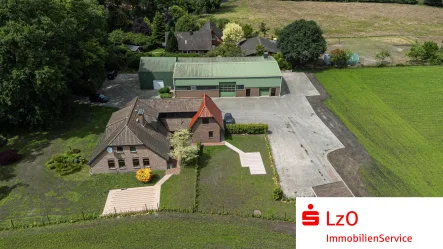 Draufsicht - Haus kaufen in Wiefelstede - Charmantes Wohnhaus mit Halle auf großem Grundstück