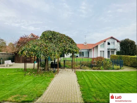  - Haus kaufen in Steinfeld - Vielseitig nutzbare Immobilie mit zusätzlichem Baugrundstück in Steinfeld (Oldenburg), Mühlen