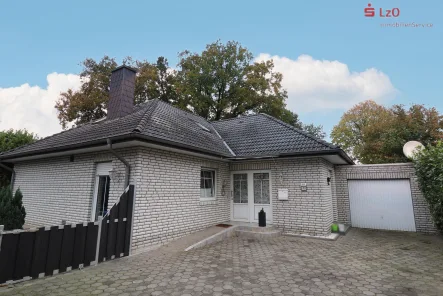  - Haus kaufen in Löningen - Bungalow in attraktiver Siedlungslage