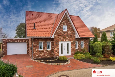 Außenansicht - Haus kaufen in Apen - Modernes Einfamilienhaus mit toller Aussicht im TOP-Zustand in Augustfehn