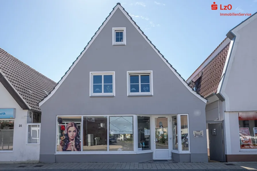 Vorderansicht - Haus kaufen in Elsfleth - Einfamilienhaus mit Gewerbe in Elsfleth