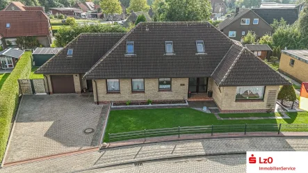 Luftaufnahme - Haus kaufen in Wangerland - Großer Bungalow mit Einliegerwohnung!