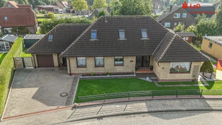 Luftaufnahme - Haus kaufen in Wangerland - Großer Bungalow mit Einliegerwohnung!