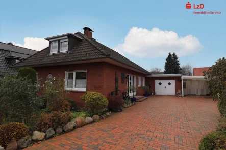  - Haus kaufen in Lastrup - Einfamilienhaus mit Garage und Carport in attraktiver Siedlungslage in Lastrup