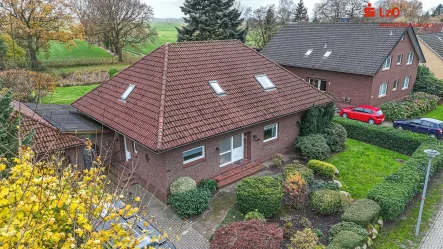 Luftaufnahme - Haus kaufen in Schortens - Gepflegter Bungalow in traumhafter Lage