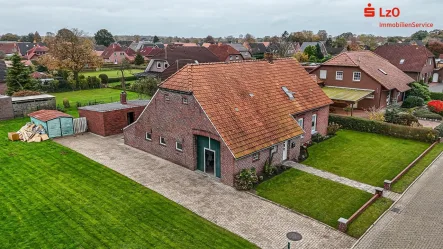 Außenansicht - Haus kaufen in Zetel - Geräumiges Wohnen in zentraler Lage