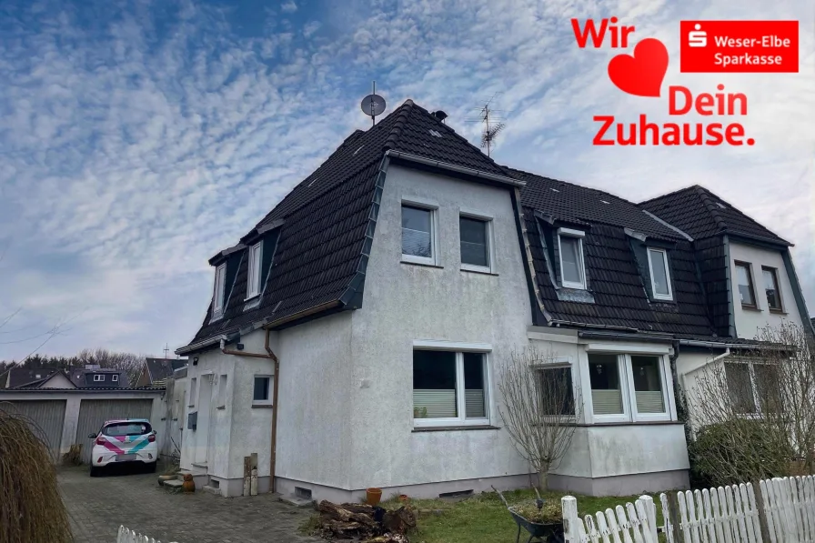 Straßenansicht - Haus kaufen in Bremerhaven - Teilmodernisierte Doppelhaushälfte in Leherheide