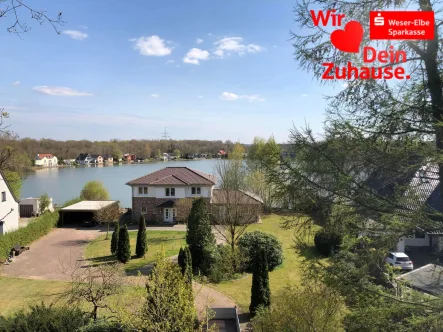 Bild von oben - Haus kaufen in Geestland - Traum-Villa direkt am See in Debstedt