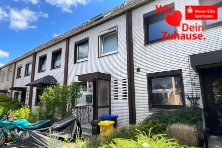 Vorderansicht - Haus kaufen in Bremerhaven - Gepflegtes, modernisiertes RMH mit Garage 