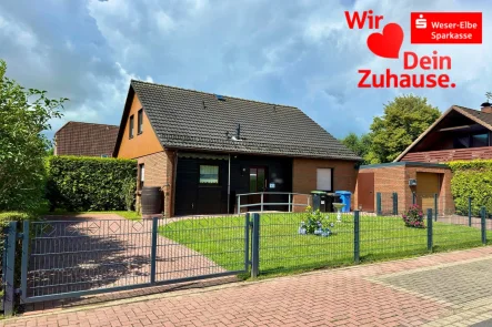 Straßenansicht - Haus kaufen in Otterndorf - Nicht weit vom Otterndorfer Deich!