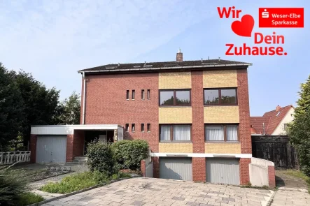 Straßenansicht I - Haus kaufen in Geestland - Großes 3-Familienhaus in zentraler Lage