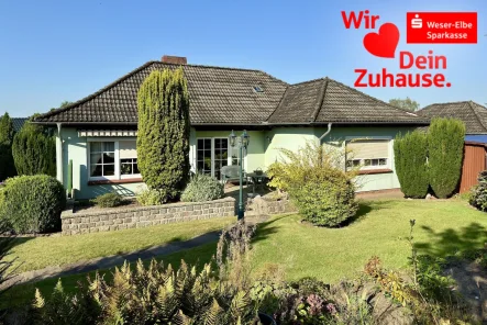 Rückansicht - Haus kaufen in Hemmoor - Bungalow mit traumhaftem Garten