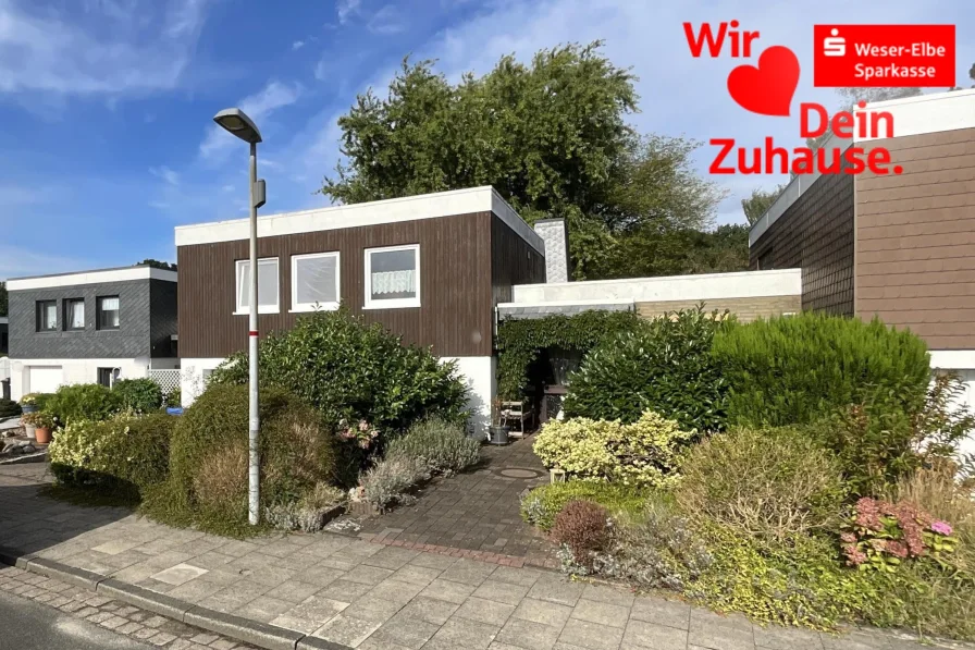 Straßenansicht I - Haus kaufen in Geestland - Vermietetes Wohnhaus mit eigenem Garten