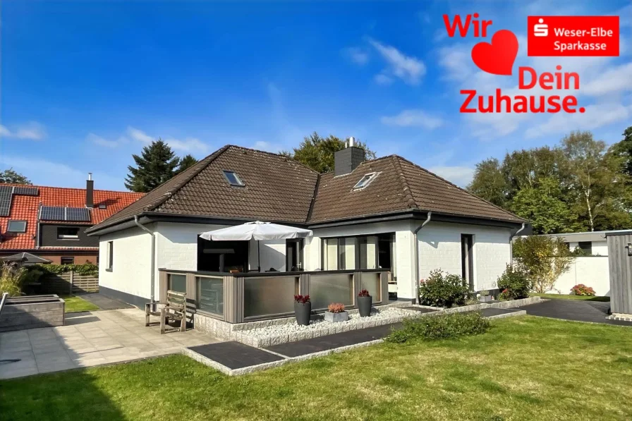 Vorderansicht - Haus kaufen in Schiffdorf - Gepflegter und moderner Bungalow mit Doppelgarage 