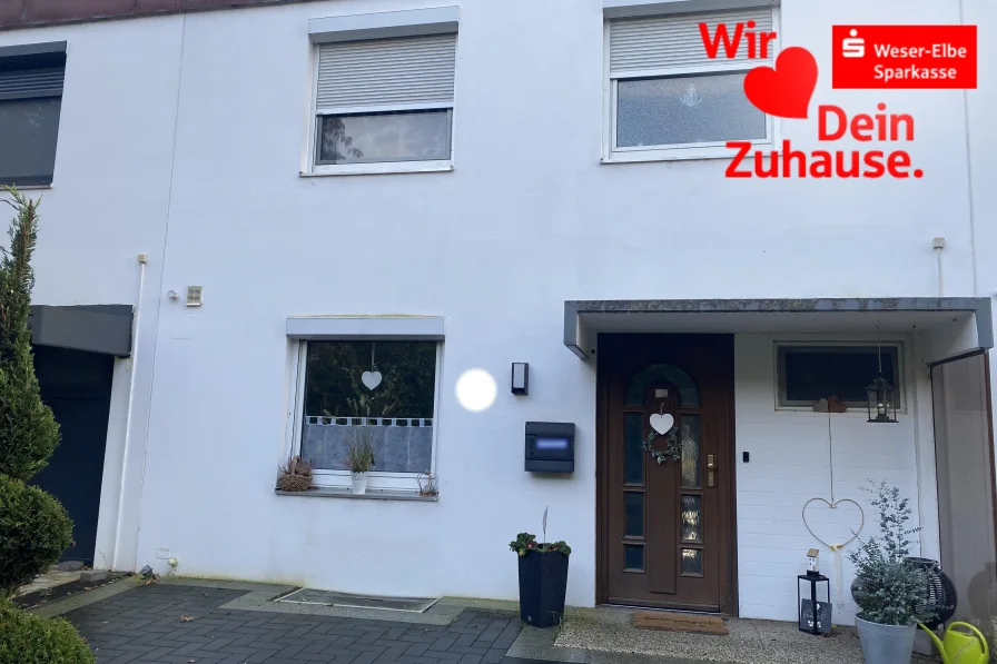 Vorderansicht - Haus kaufen in Geestland - Reihenmittelhaus mitten in Langen