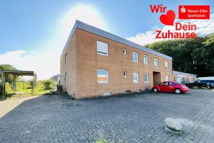 Außenansicht - Haus kaufen in Loxstedt - Vielseitig nutzbare Gewerbeimmobilie mit Wohnung