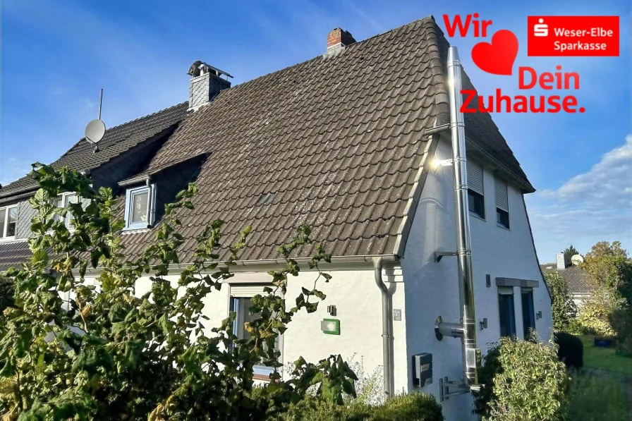 Straßenansicht - Haus kaufen in Bremen - DHH mit barrierefreiem Bad in Bremen-Ellener Feld