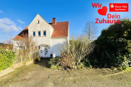 Außenansicht - Haus kaufen in Loxstedt - Wohnhaus mit Friseursalon und vielen Möglichkeiten