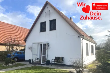 Seitenansicht - Haus kaufen in Geestland - Wohnhaus in ruhiger Lage