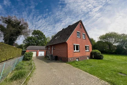  - Haus kaufen in Friedeburg - Kurzfristig verfügbar: Wohnhaus mit großem Grundstück 