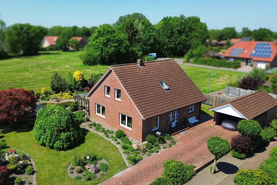 Straßenfront - Haus kaufen in Weener - Tolles Grundstück mit unverbautem Weitblick