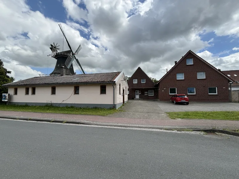  - Haus kaufen in Esens - Mehrfamilienhaus mit Gewerbe im Herzen Esens