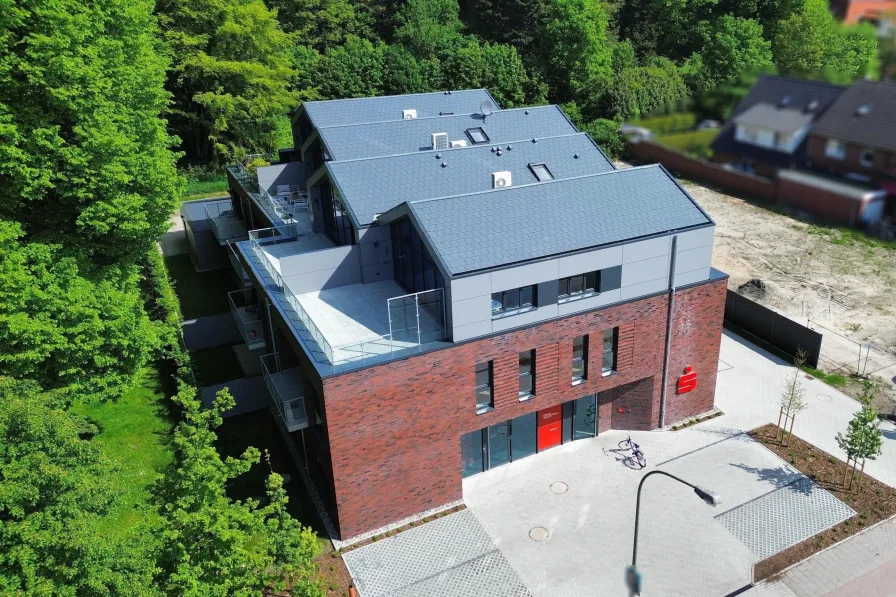 Straßenfront - Wohnung kaufen in Leer - Attraktive Eigentumswohnung mit Aufzug und Balkon