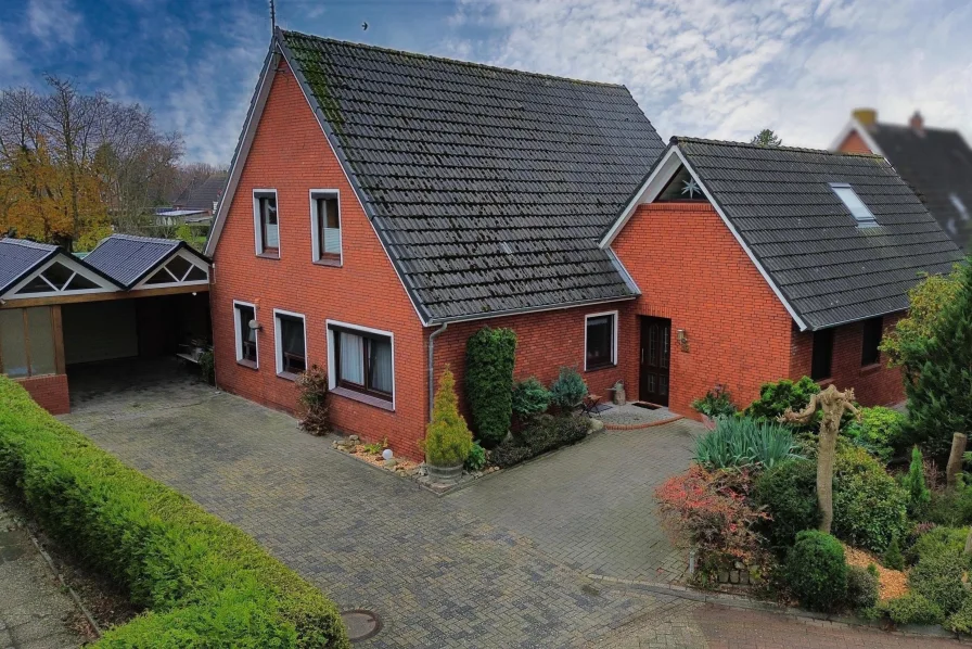 Straßenfront - Haus kaufen in Jemgum - Ruhig gelegen, mit Einliegerwohnung und schönem Garten