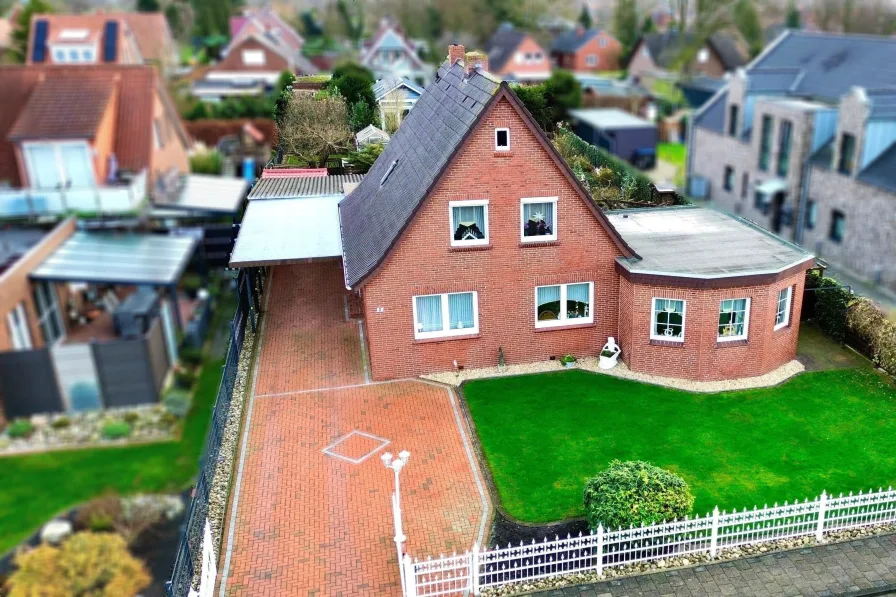 Vogelperspektive - Haus kaufen in Leer - Großzügiges Wohnen in beliebter Siedlungslage 