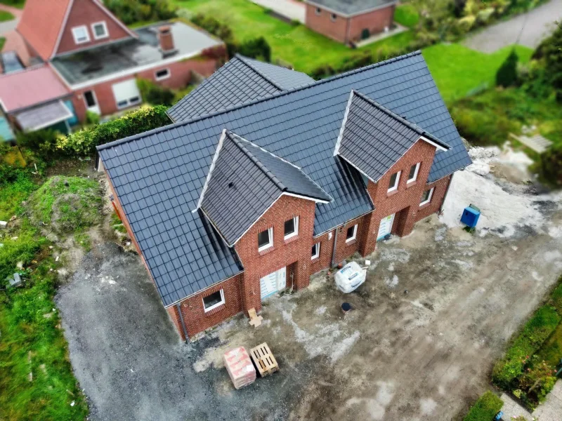 Vogelperspektive - Haus kaufen in Moormerland - Neubau-Doppelhaus, hochwertig und energieeffizient