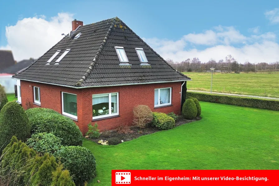 Seitenansicht mit Weitblick - Haus kaufen in Moormerland - Gemütliches Häuschen mit Weitblick!