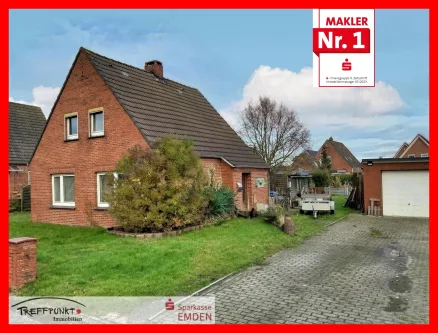 Titelbild - Haus kaufen in Hinte - Stark sanierungs-bedürftiges EFH mit Garage