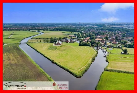 Blick auf die Insel - Grundstück kaufen in Emden - Wohnungsbaugrundstücke in traumhafter Lage am Kanal! 