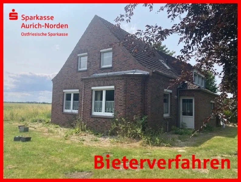 Blick aus dem Garten - Haus kaufen in Norden - Im Bieterverfahren! Geräumiges Wohnhaus in Alleinlage in Norden-Neuwesteel