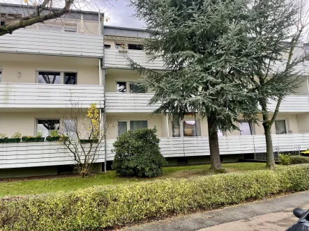 Anblick von der Straße - Wohnung kaufen in Barsinghausen - 3-Zimmer-Wohnung mit Balkon und PKW-Stellplatz