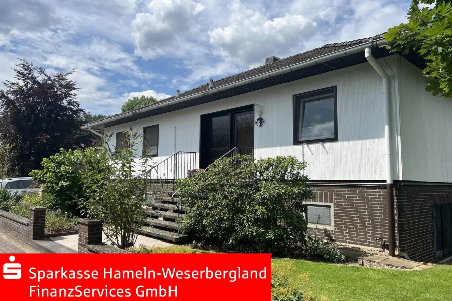  - Haus kaufen in Heyen - Gepflegter Winkelbungalow in Heyen