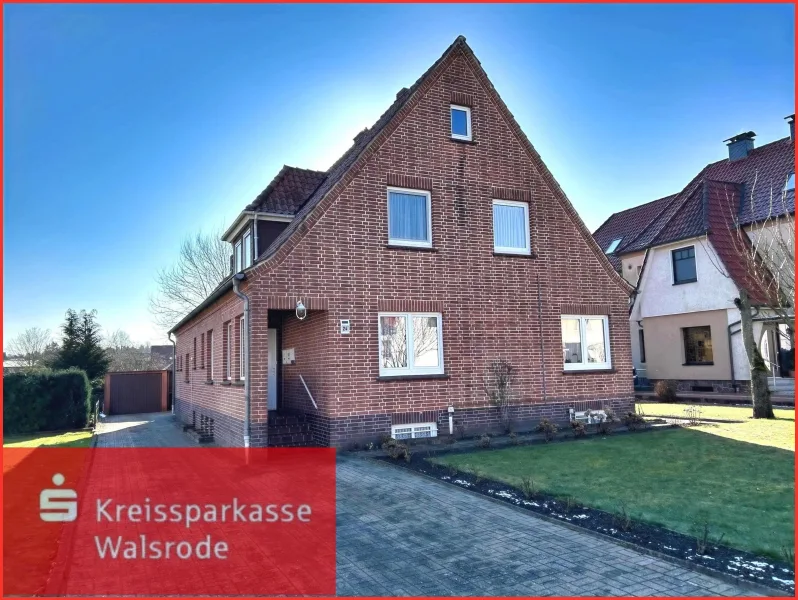 Titelbild - Haus kaufen in Walsrode - Sehr gepflegtes Wohnhaus mit Garage und Teilkeller in Bomlitz