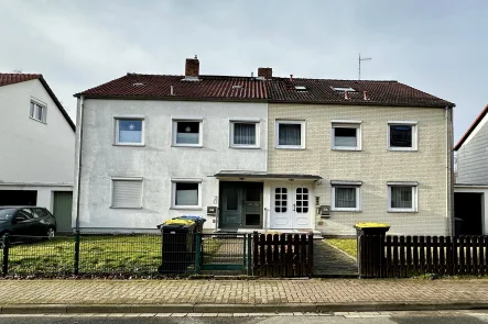 DHH, Linkes Gebäudeteil - Haus kaufen in Wolfenbüttel - Kapitalanlage mit zwei vermieteten Wohnungen