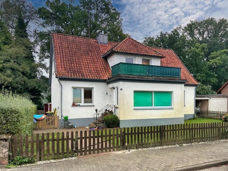 Straßenansicht - Haus kaufen in Faßberg - Wohnen am Heidesee