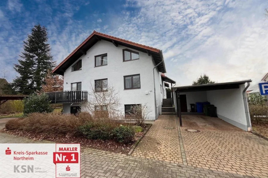 Vorderansicht - Haus kaufen in Landolfshausen - Mehrfamilienhaus mit Carports und Pkw-Stellplätzen in Landolfhausen!