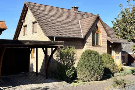 Vorderansicht - Haus kaufen in Nörten-Hardenberg - Stilvolles Klinkerhaus - Ihr neues Zuhause