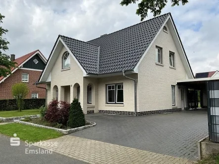 Vorderansicht - Haus kaufen in Haren - Traumhaftes Familienhaus in Haren:moderne Wohnkultur in perfekter Lage