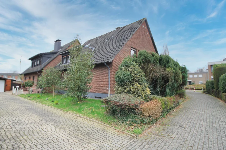 Straßenansicht - Haus kaufen in Hünxe - Ein ruhiges Zuhause für die ganze Familie!