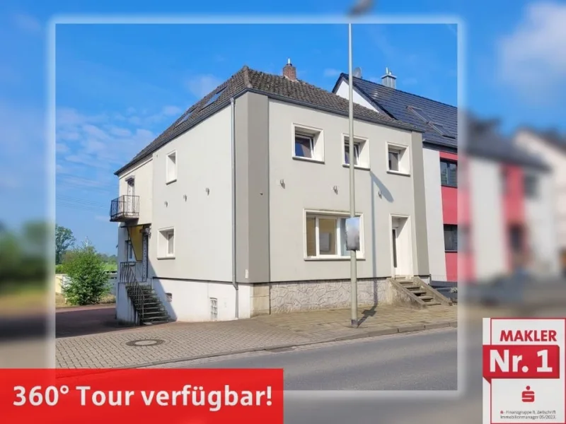 Vorderseite - Haus kaufen in Voerde - Ein 2-Parteienhaus mit verschiedenen Nutzungsmöglichkeiten!