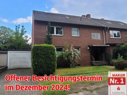 Vorderansicht - Haus kaufen in Voerde - Besondere Gelegenheit - Zweifamilienhaus in Voerde-Friedrichsfeld!