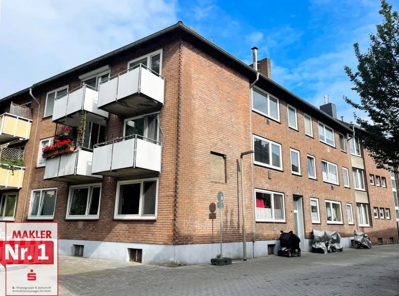 Seitenansicht - Haus kaufen in Wesel - Individualität für Ihre Mieter! Mehrfamilienhaus in Wesel